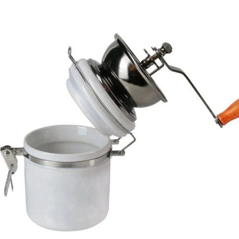 Molinillo de café manual barista abierto mostrando mecanismo cerámico de molienda