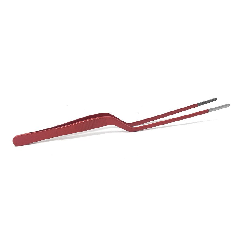 Pinza profesional roja para manipular alimentos delicados con precisión