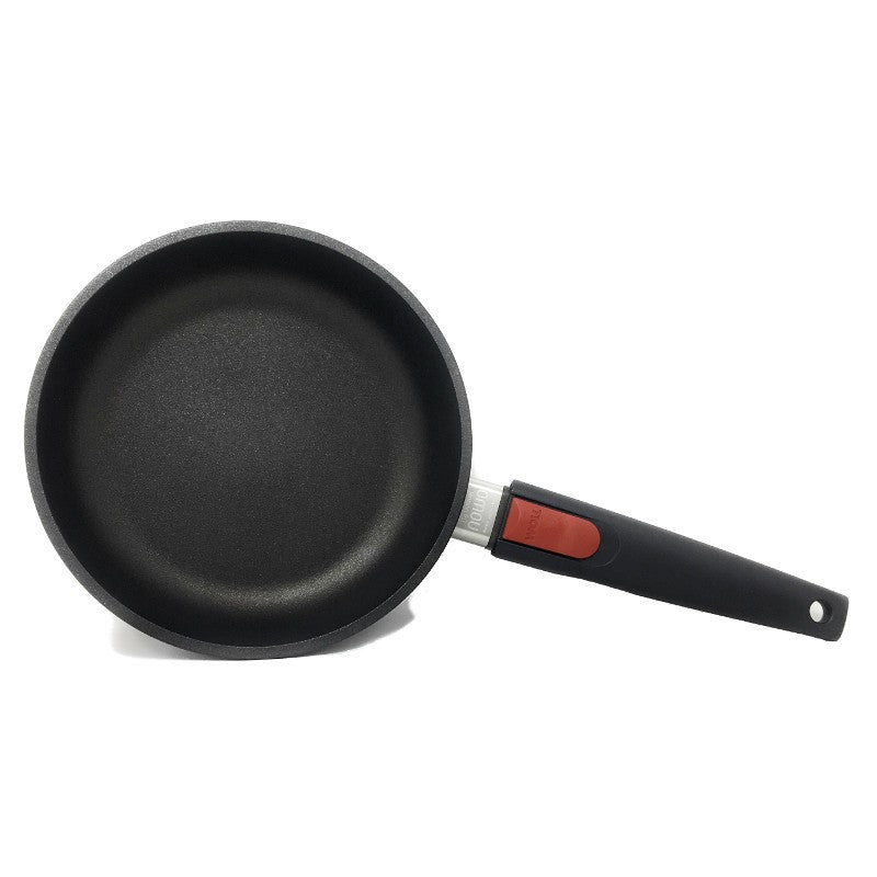 Set 3 sartenes profesionales Woll titanio en cocina de inducción distribución uniforme del calor